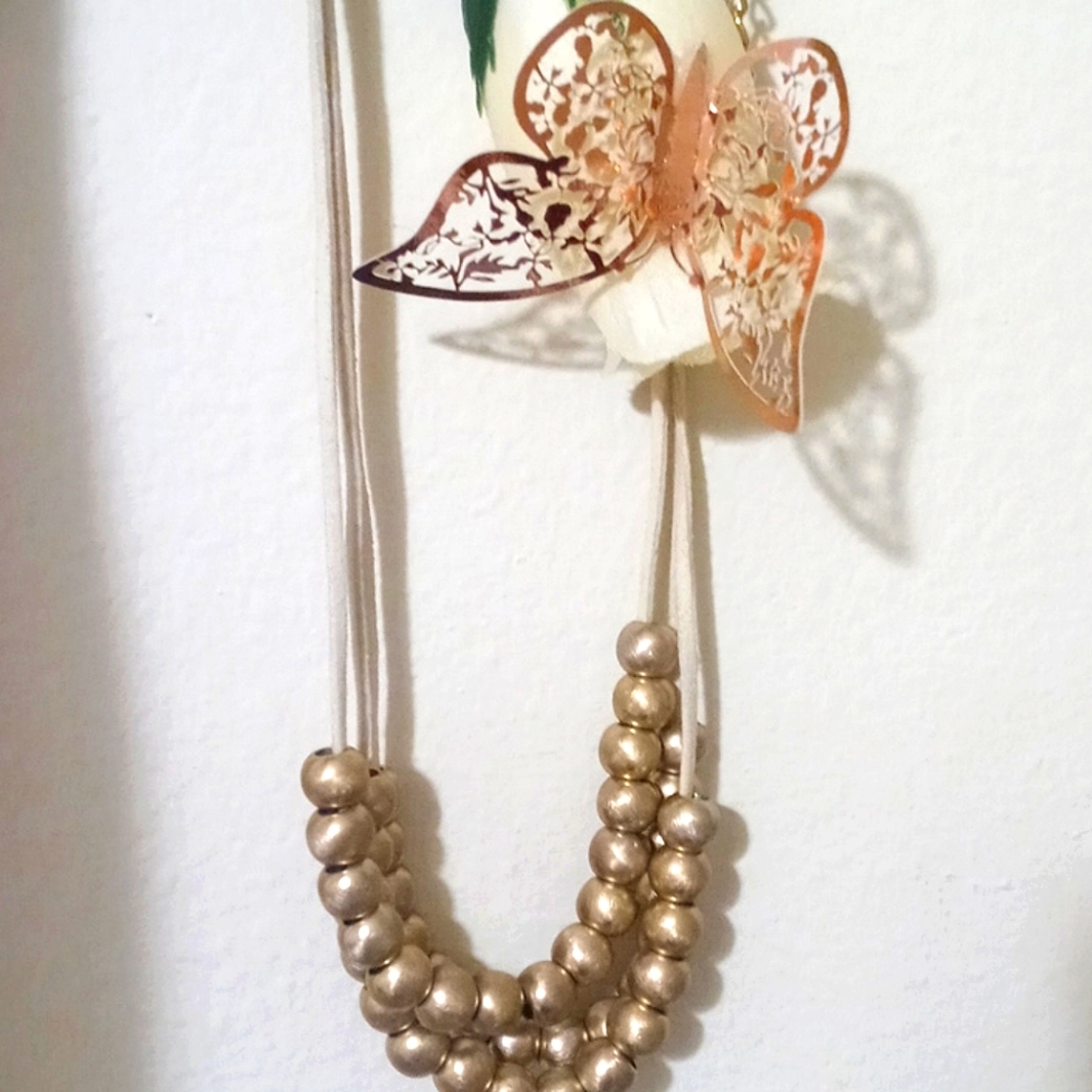 Cream and gold necklace